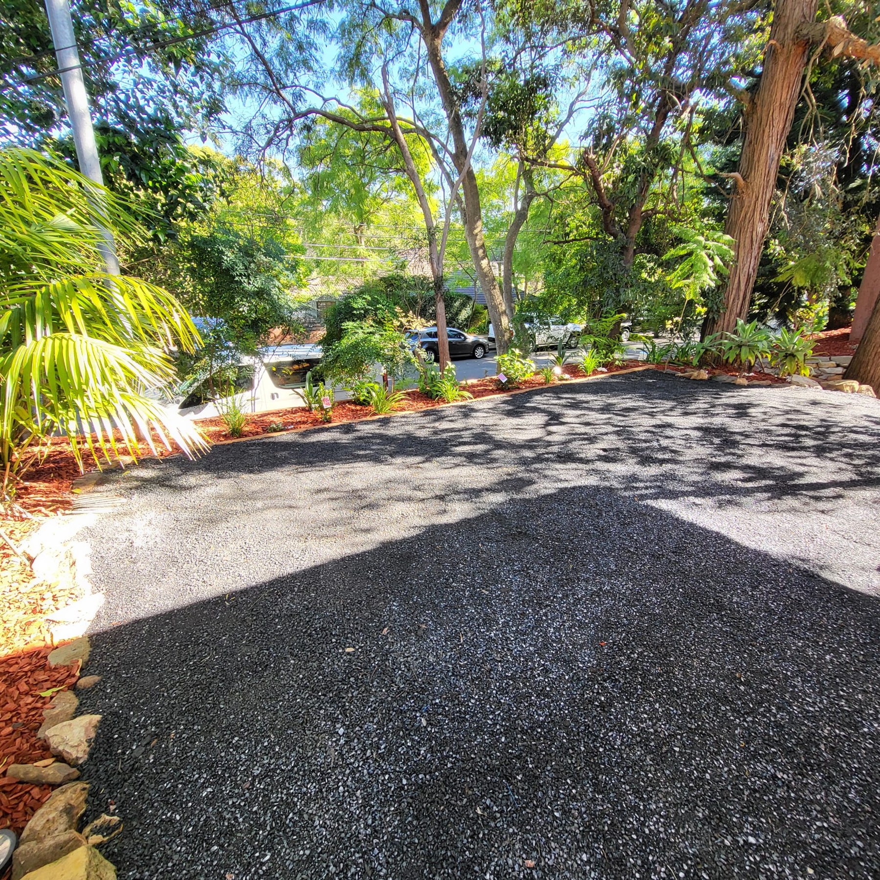 Landscaped gravel area with planted garden borders in Pennant Hills, NSW